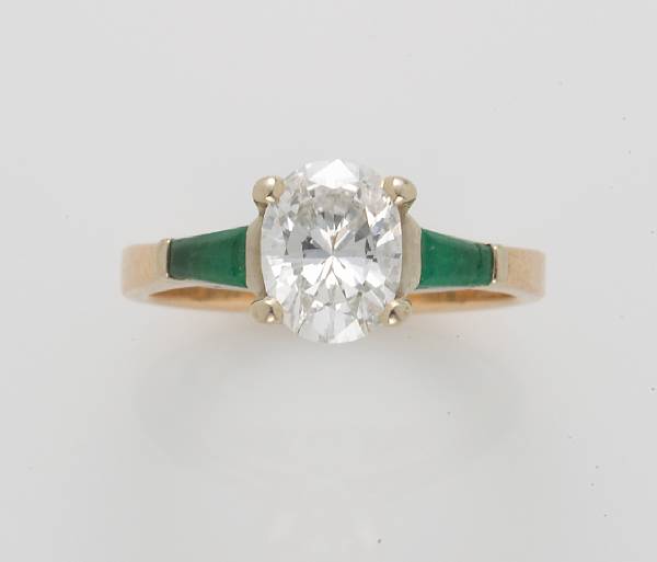 Appraisal: A diamond and emerald ring estimated diamond weight carats mounted