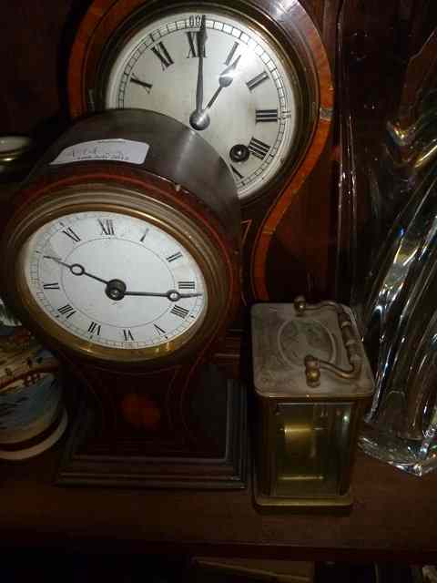 Appraisal: A MAHOGANY BALLOON CASED MANTEL CLOCK with decorative inlay high