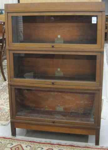 Appraisal: A STACKING WALNUT BOOKCASE The Globe-Wernicke Sectional Bookcase Co Ohio