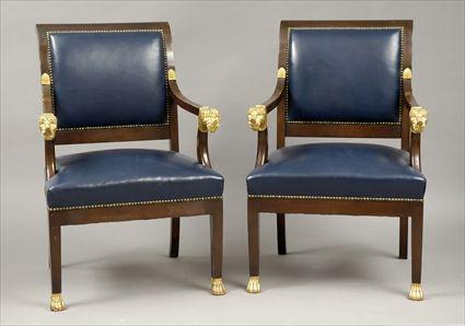 Appraisal: Eight Empire-Style Parcel-Gilt and Carved Mahogany Leather-Upholstered Scroll-Back Armchairs Modern