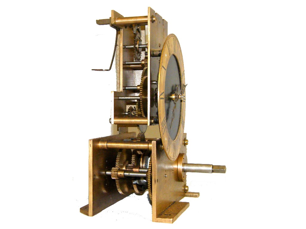 Appraisal: Unusual single train clock movement with subsidiary dial This is