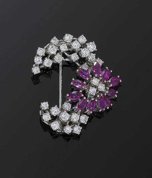 Appraisal: BRILLIANT-CUT DIAMOND AND RUBY BROOCH White gold Elegant sickle-shaped brooch