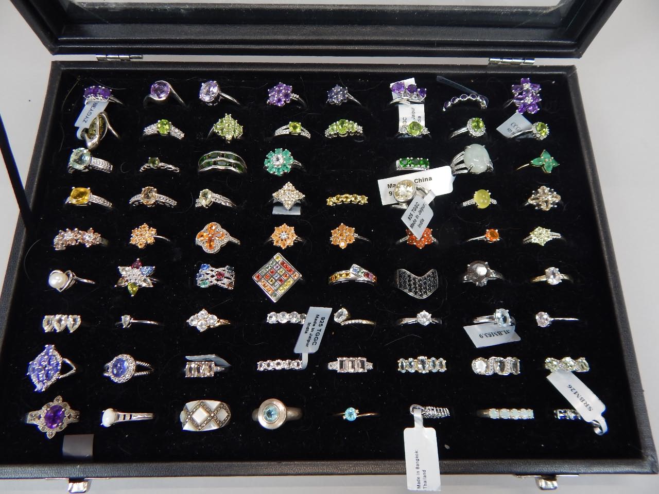 Appraisal: A large quantity of dress rings each stone set in