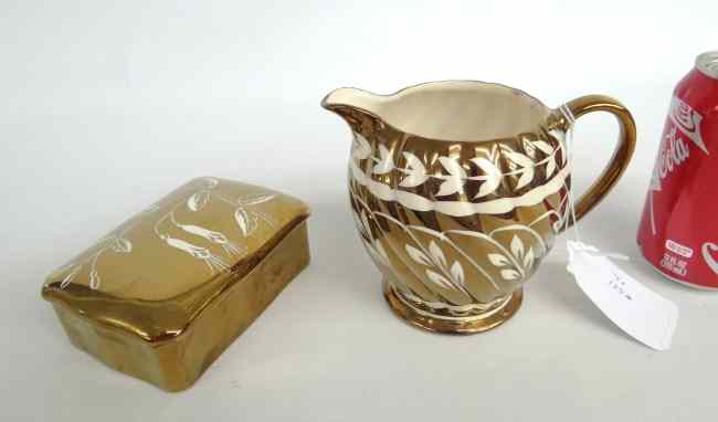 Appraisal: Lot including copper lustre creamer and cigarette case