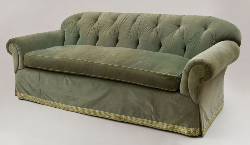 Appraisal: GREEN TUFTED VELVET UPHOLSTERED SOFA The tufted backrest above scrolled