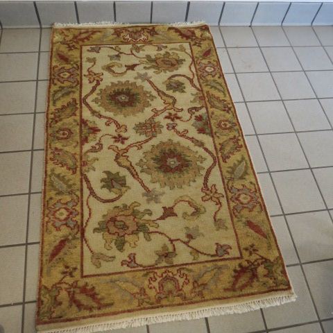 Appraisal: Oushak Persian Handmade Rug flowering vine on ivory field '