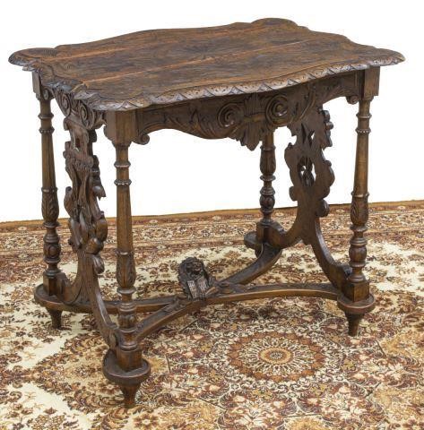 Appraisal: Italian Renaissance Revival walnut table late th c cartouche-shaped top