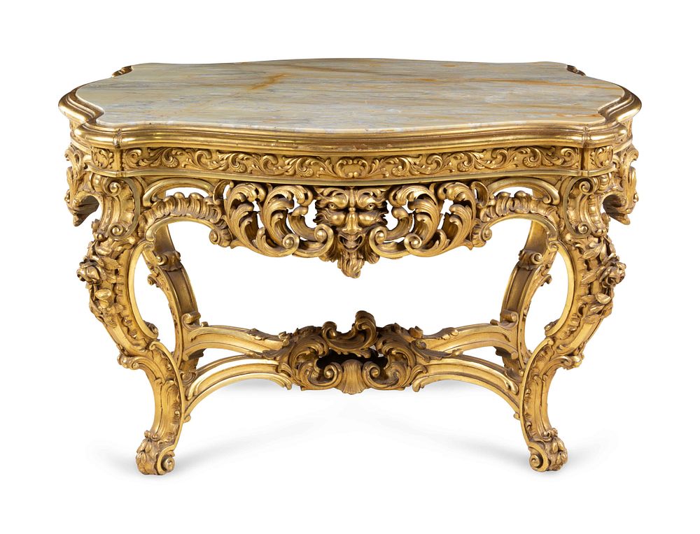 Appraisal: A Neoclassical Carved Giltwood Marble-Top Center Table A Neoclassical Carved