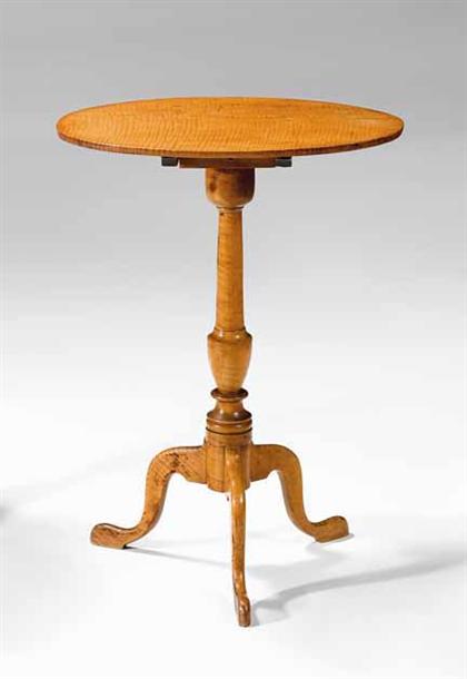 Appraisal: Tiger maple tilt-top candlestand mid-atlantic states circa The oval top