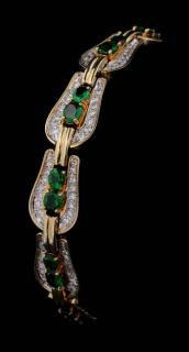 Appraisal: A K GOLD DIAMOND AND TSAVORITE GARNET BRACELET A k