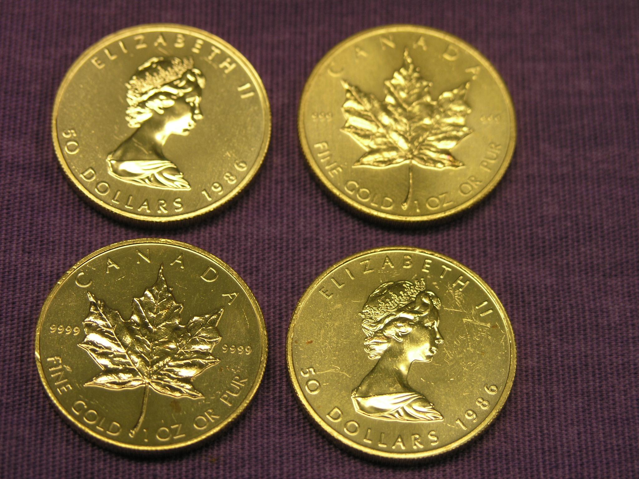 Appraisal: Four Canadian Dollars gold coins