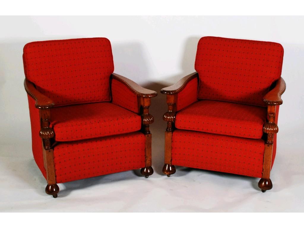 Appraisal: PAIR OF 'S OAK FRAMED EASY ARMCHAIRS each with arched