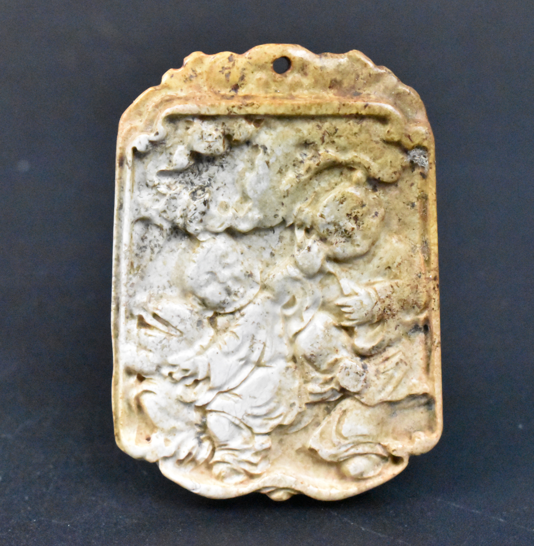 Appraisal: A Chinese chicken bone white jade plaque dating from the