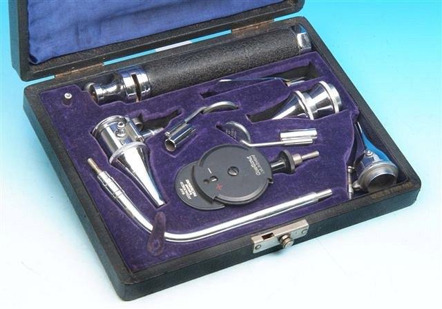 Appraisal: A GOOD OPHTHALMOSCOPE BY GOWLAND complete with all accessories in