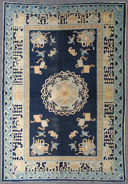 Appraisal: A Chinese rug size approximately ft in x ft in