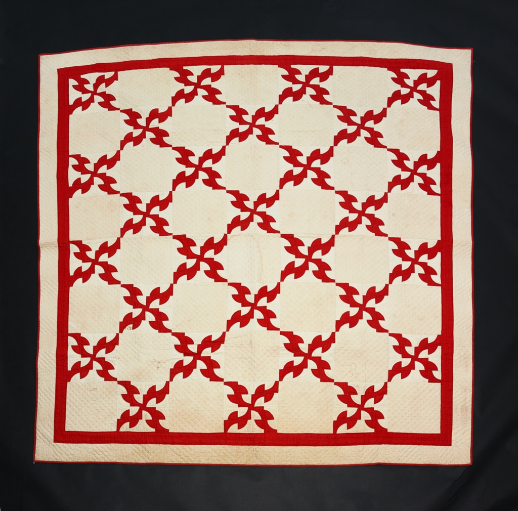 Appraisal: Ca Drunkards path quilt in red and white Stains and