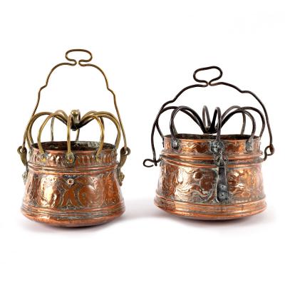 Appraisal: Two Charles I embossed copper hanging braziers probably Dutch or