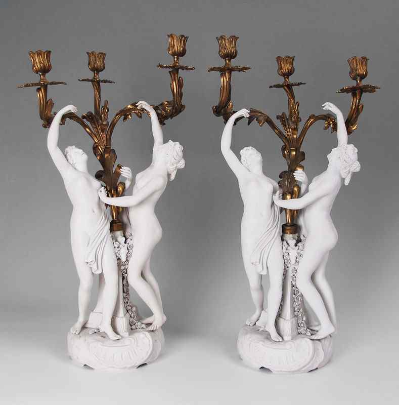 Appraisal: PAIR FRENCH GILT BRONZE AND PARIAN WARE NUDE FIGURAL CANDELABRA