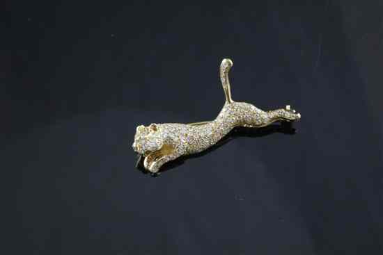 Appraisal: A diamond set gold panther brooch bears Cartier signature ins