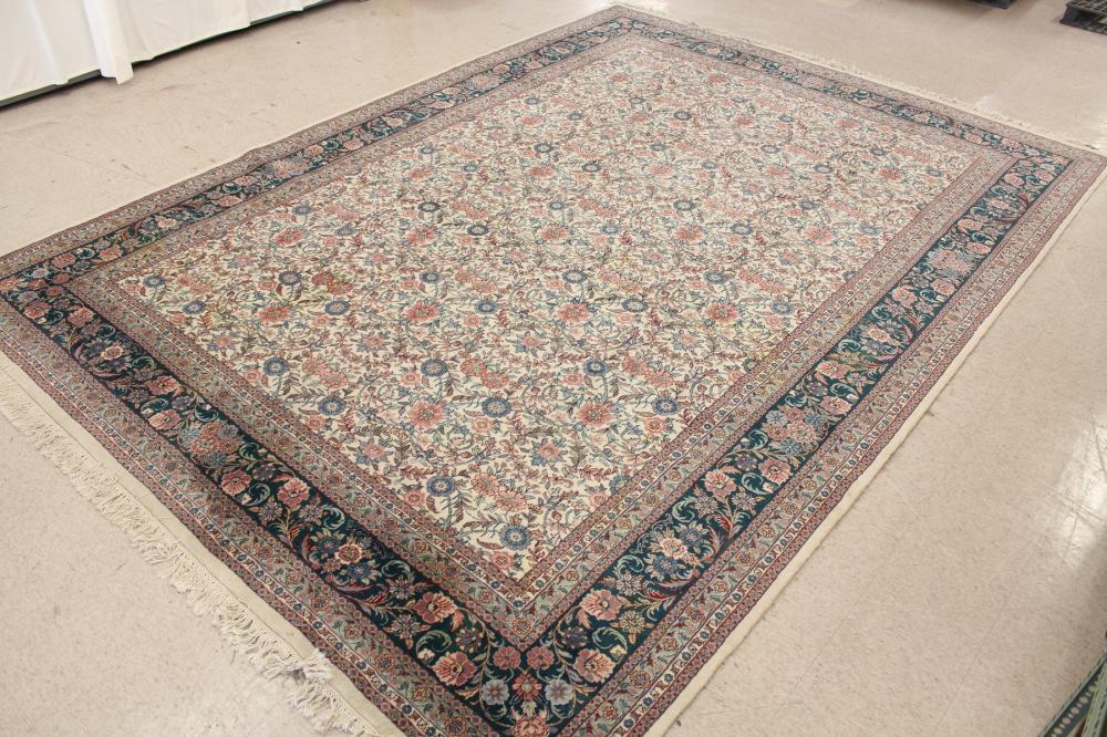 Appraisal: HAND KNOTTED ORIENTAL CARPET Indo-Persian overall floral design on cream