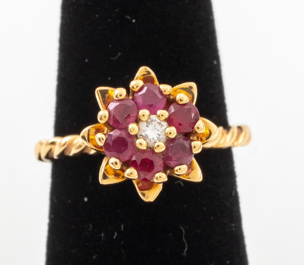 Appraisal: K YELLOW GOLD RUBY DIAMOND FLOWER RING K yellow gold