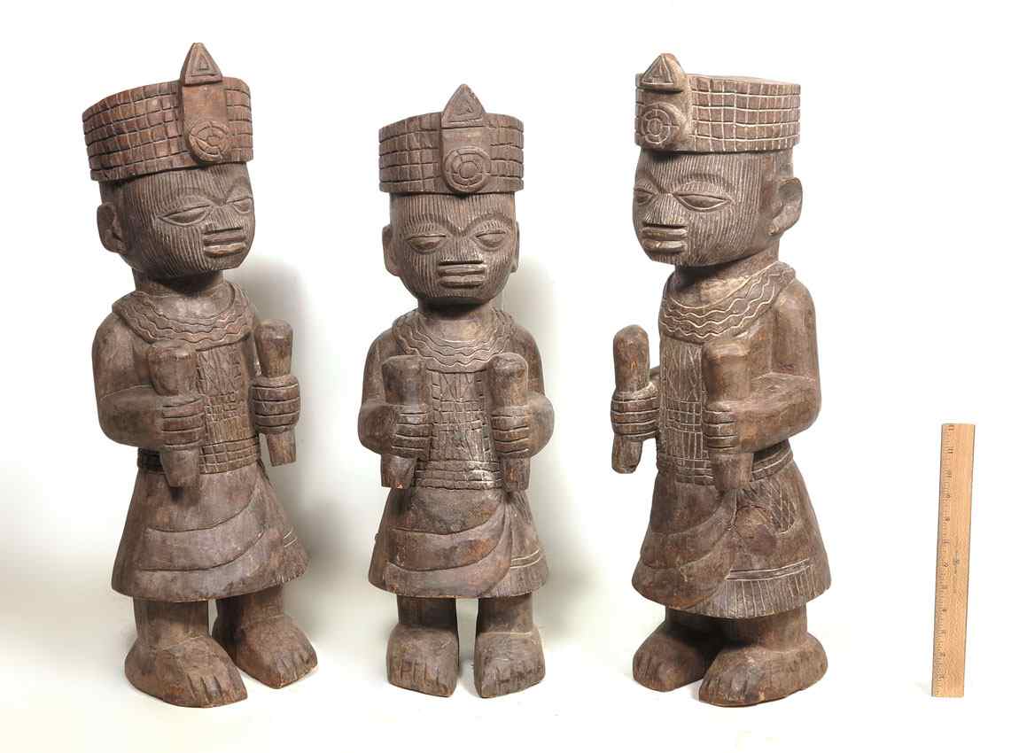 Appraisal: CARVED BENIN FIGURES '' x '' x '' lbs ''