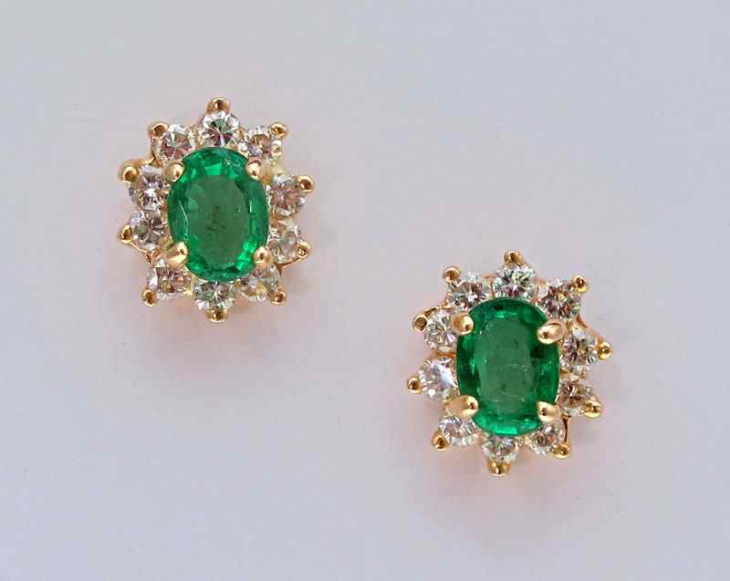 Appraisal: K EMERALD AND DIAMOND EARRINGS K yellow gold earrings contain