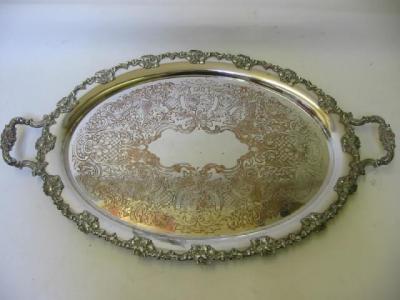 Appraisal: A VICTORIAN TRAY of oval form with loop handles the