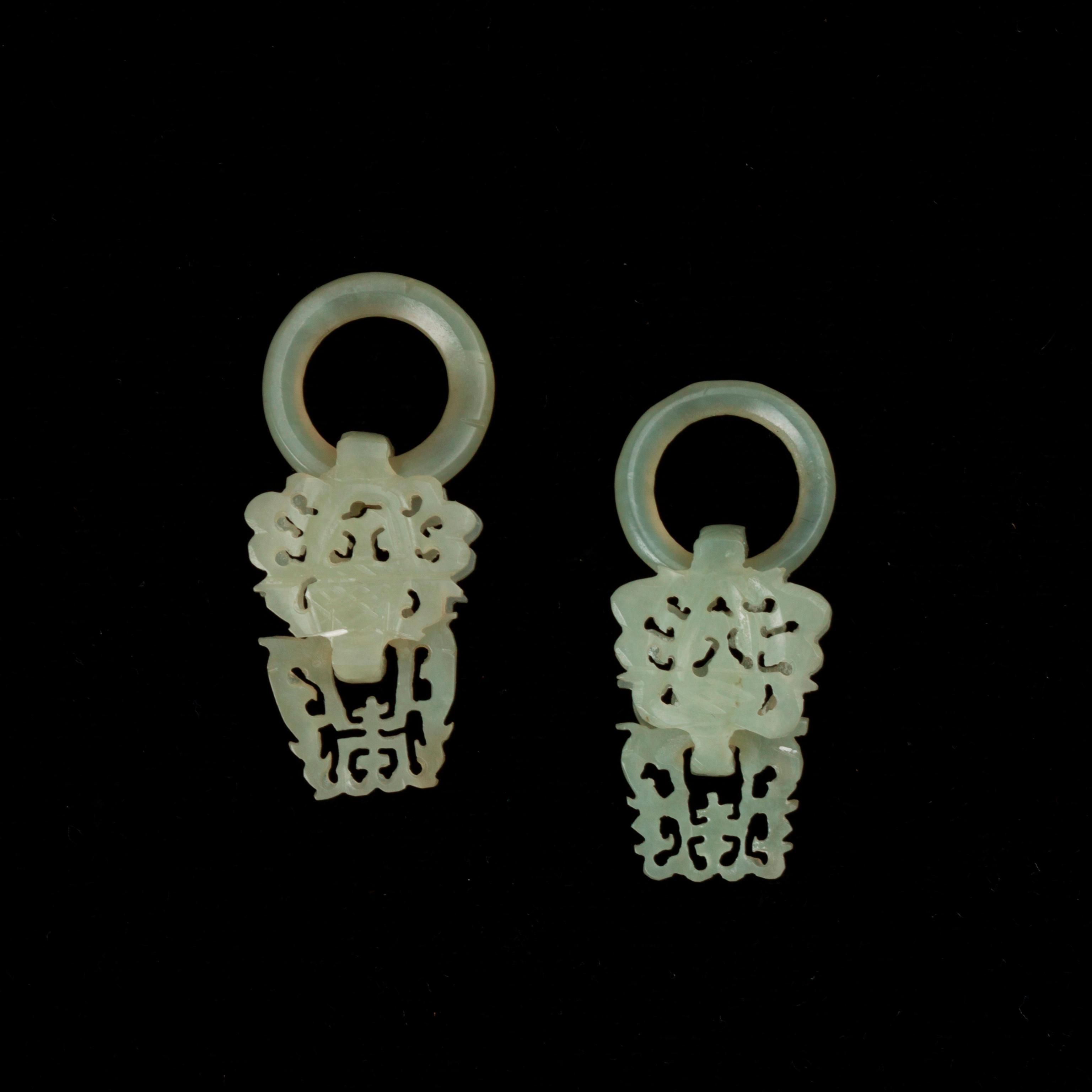 Appraisal: CARVED NEPHRITE JADE CHINESE BASKET EARRING ENHANCERS Carved nephrite earring