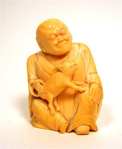 Appraisal: Chinese whale tooth ivory carving of a seated immortal th