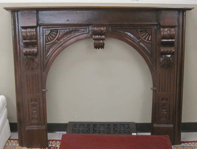 Appraisal: CARVED MAHOGANY FIREPLACE SURROUND having an open mantel over an