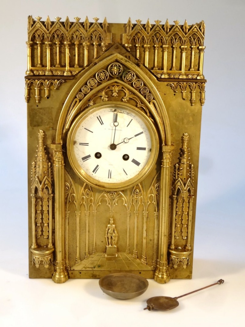 Appraisal: A thC gilt metal gothic style mantel clock the cm