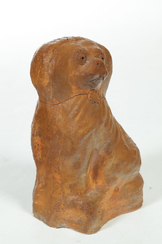 Appraisal: SEWERTILE DOG Probably Ohio early th century Seated spaniel with