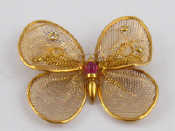 Appraisal: A yellow metal tests carat gold brooch designed as a