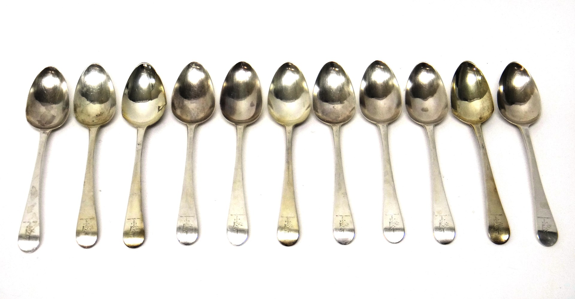 Appraisal: Twelve silver George III Old English pattern bottom marked tablespoons