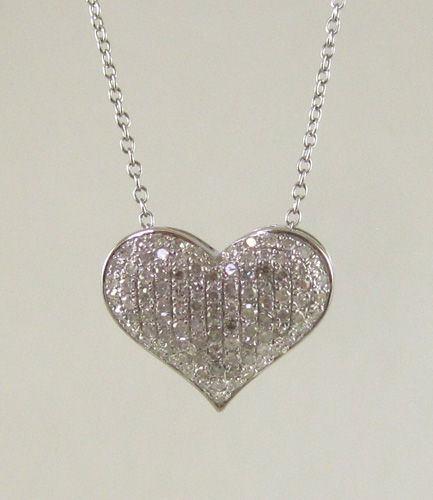 Appraisal: DIAMOND AND FOURTEEN KARAT WHITE GOLD PENDANT NECKLACE suspended on