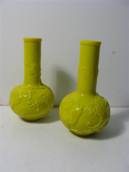 Appraisal: Pair of Chinese yellow glass vasesBottle from showing foliate sprigs