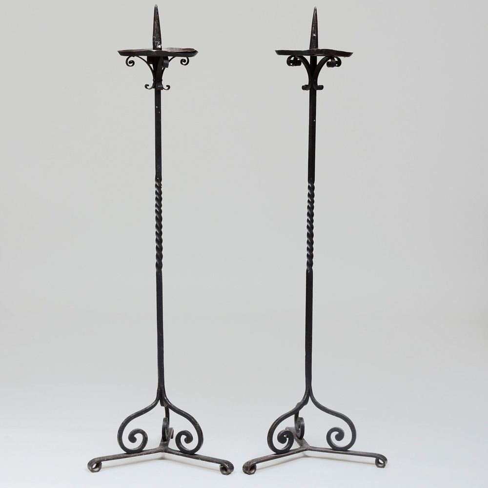 Appraisal: Pair of Wrought Iron Torch res ft in x x