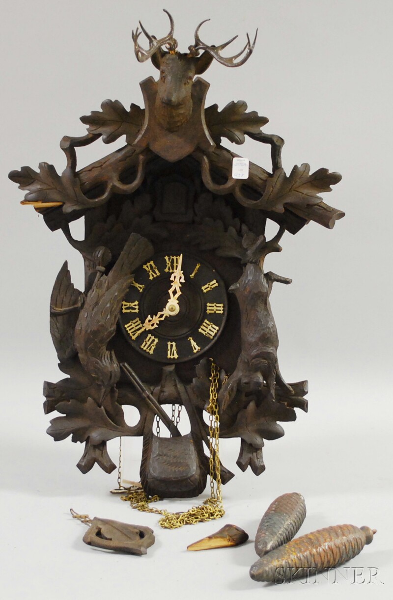 Appraisal: Black Forest Cuckoo Clock with carved case thirty-hour time and