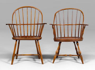 Appraisal: Two similar American Windsor armchairs each with shaped hand grips