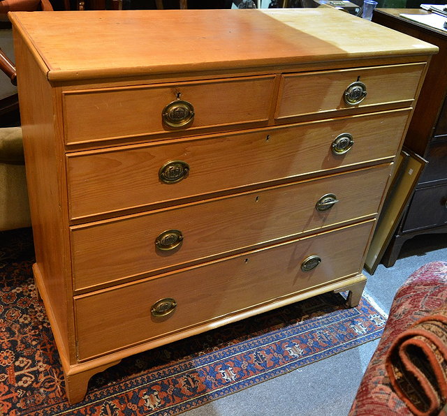 Appraisal: A George III pine straight front chest of two short