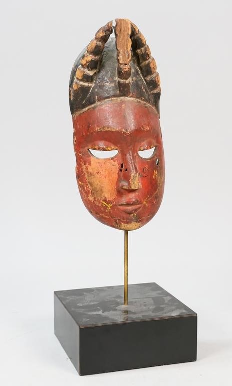 Appraisal: Cote d' Ivoire African polychrome mask on stand Mask H