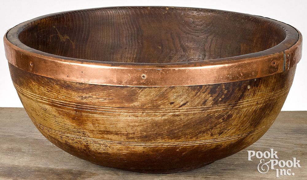 Appraisal: Turned wooden bowl th c with copper wrapped r Turned