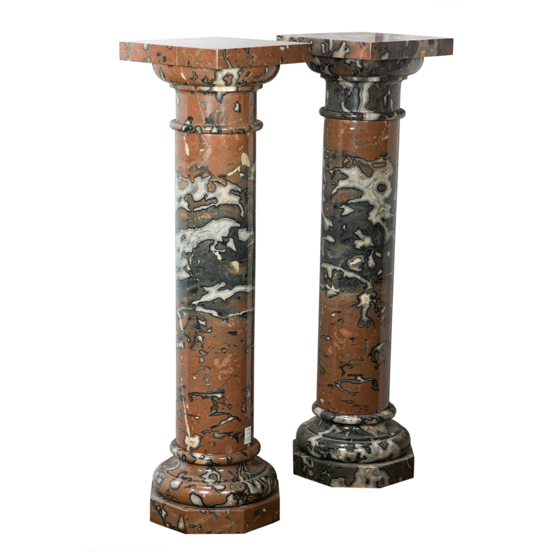 Appraisal: A PAIR OF CLASSICAL STYLE VARIEGATED MARBLE PEDESTALS A pair