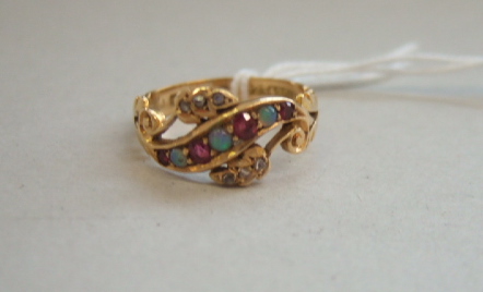 Appraisal: An ct gold rose diamond ruby and opal set ring