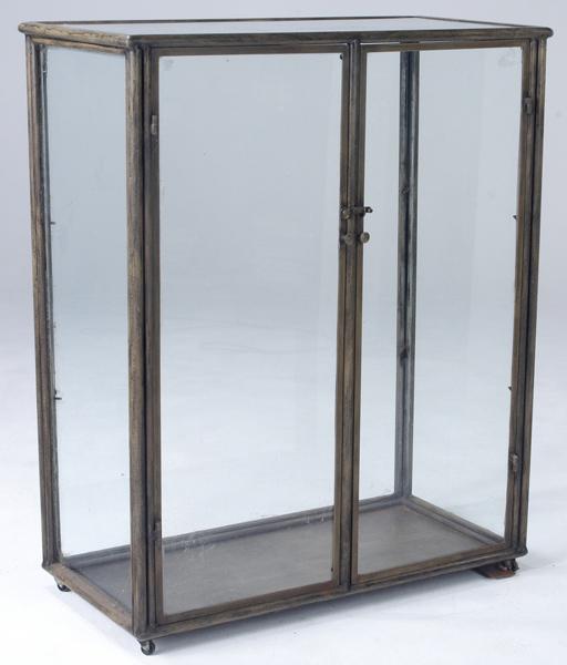 Appraisal: MODERN Large patinated metal and glass display case on casters