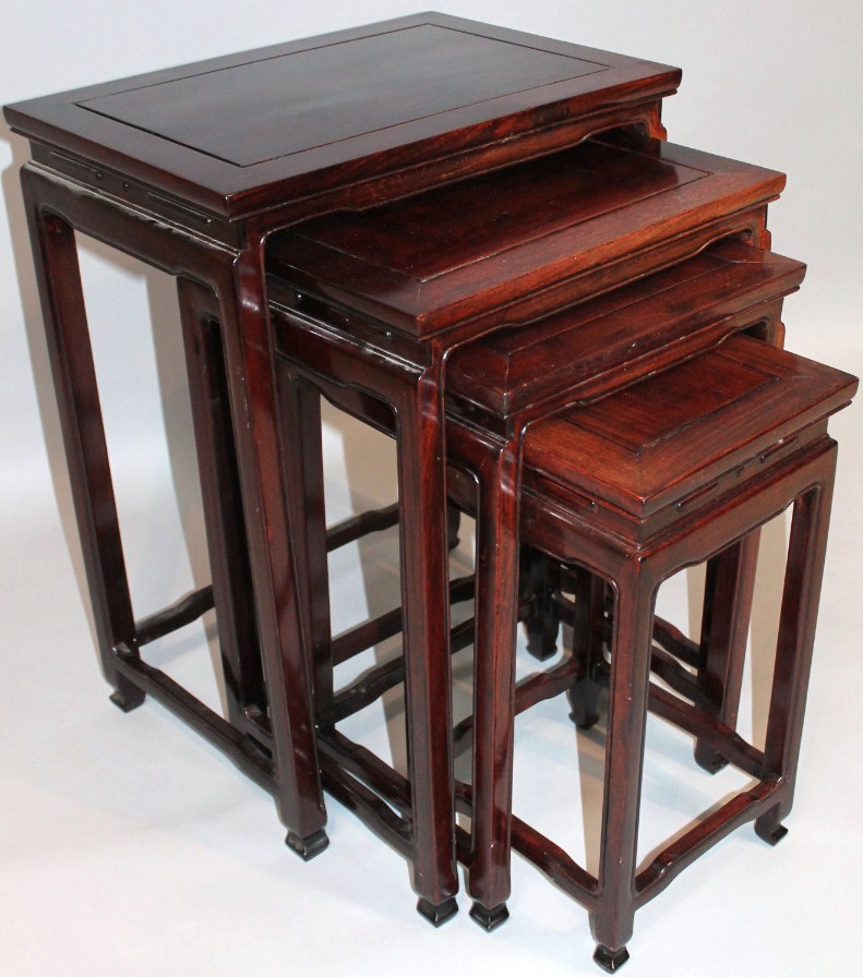 Appraisal: A nest of thC Chinese design hardwood tables each with