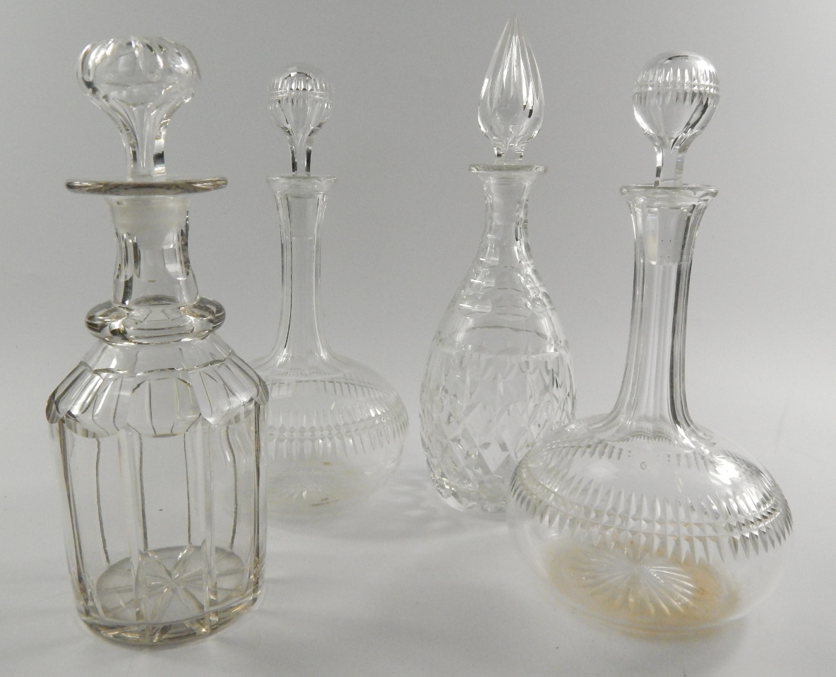 Appraisal: A pair of Victorian cut glass globe and shaft decanters