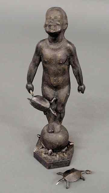 Appraisal: Faux bronze cast metal figure of a boy with turtles