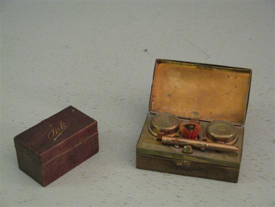 Appraisal: Leather covered and brass oval travelling writing compendium with two